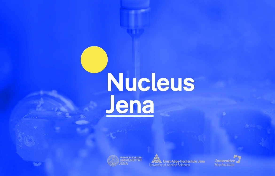 Logo von Nucleus Jena mit gelbem Punkt auf blauem Grund